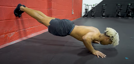 Wall Planche Push-Up